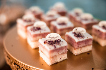 a table full of delicious cakes