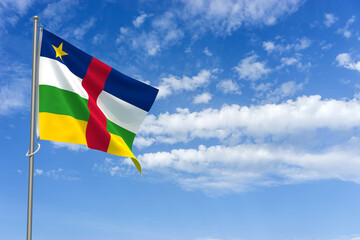 Central African Republic Flag Over Blue Sky Background. 3D Illustration