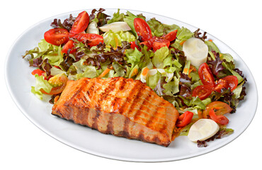 Grilled salmon with green salad with heart of palm and cherry tomatoes in white plate isolated on transparent background.