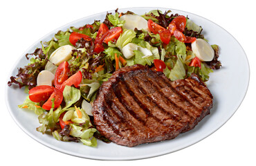 Grilled steak with green salad with hearts of palm and cherry tomatoes on white plate isolated on transparent background.