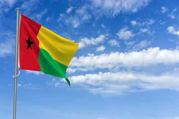 Republic of Guinea-Bissau Flag Over Blue Sky Background. 3D Illustration