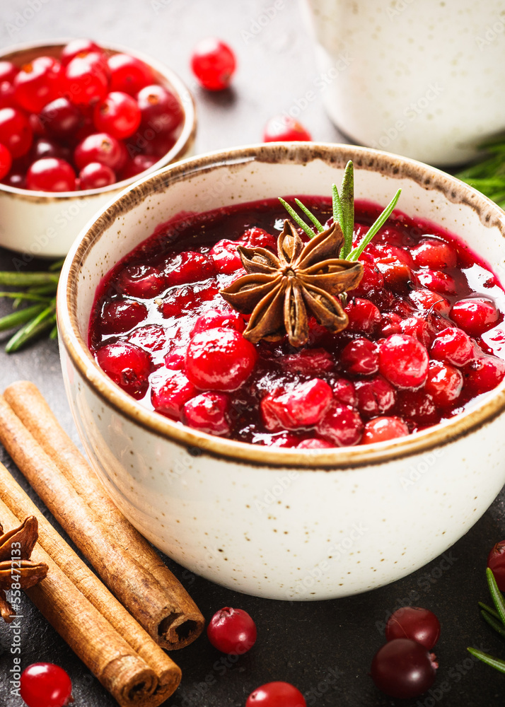 Wall mural Cranberry sauce in a bowl top view.