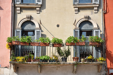 Fototapeta na wymiar Balcony of house in Verona city