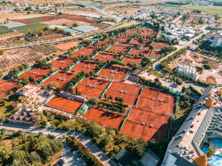 Tennis Clay Court. View from the bird's flight. Aerial view of the tennis courts in the luxury resort.
