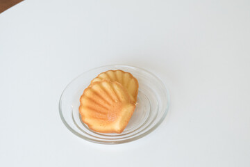 French madeleine cookies on plate,traditional French sweet dessert.