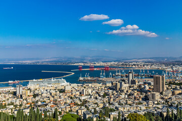 Panoramic view of the harbor port of Haifa, with downtown Haifa, the harbor, the industrial zone in a sunny winter day. Haifa, Northern Israel