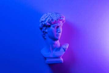 Miniature David's sculpture in neon lights.