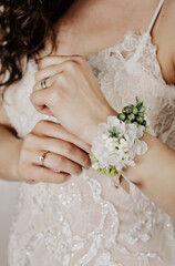 Bride Touching Her Wrist Corsage