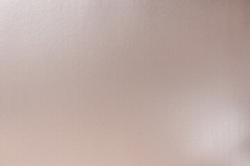Silver background with cardboard texture and gradient.