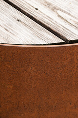 Detail of corten bench with wooden surface