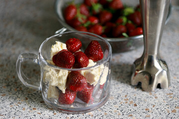 Strawberry and cream cheese summer cake on white marble board. Homemade summer dessert in spring decoration. brunch ideas. easter dessert.