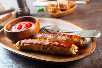 Sausages fried with spices and herbs, Selective focus
