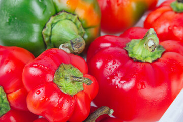 Ripe and tasty red sweet pepper or paprika isolated over white background. The concept of organic and healthy food. Agriculture and harvest. Vegetarian food. Supermarket banner. Selective focus.