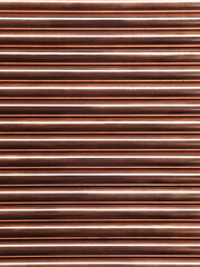 Copper Tubes. Copper water pipes background texture.