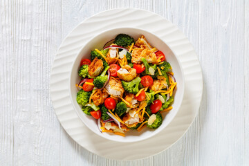 fried chicken tenders broccoli salad in bowl