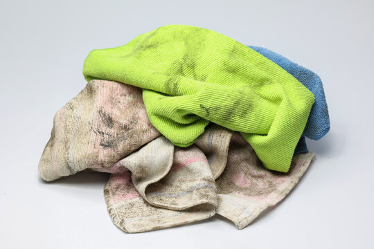Pile of dirty old rag suspended isolated on white background.