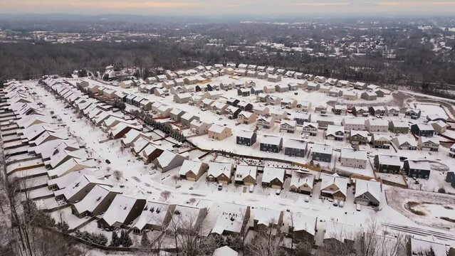 Aerial shot of snow covered small town in Knoxville, Tennessee in the winter.