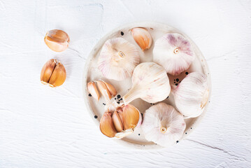 Garlic Cloves and Bulb in vintage claim bowl.