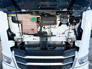 The engine compartment of a truck. Close-up view of the engine compartment