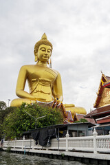 The view of the giant buddha at Wat Paknam from the river