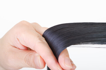 Obraz premium 髪の毛を触る女性