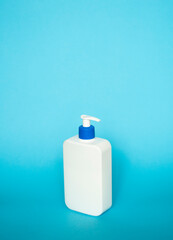 Close up liquid container for shampoo, gel, lotion, cream, bath foam etc. Blank unbranded cosmetic plastic bottle with dispenser pump.