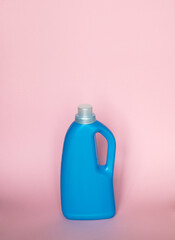 Blue plastic bottle for liquid laundry detergent or cleaning agent or bleach or fabric softener.
