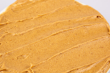 Texture of peanut butter. Whirlwind propagation. Organic keto food. Healthy creamy paste. Smooth...