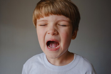 Closeup portrait of a kid crying