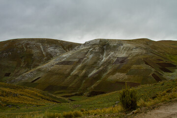 Landscape of the andes of Peru with a mountain with some snow. Concept of nature, landscapes.