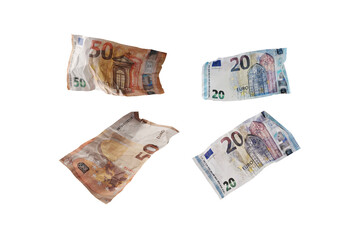 Used and crumpled fifty and twenty euro banknotes isolated on a transparent background, finance concept for money themes, business, investment or lottery, selected focus