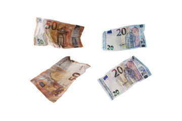 Used and crumpled fifty and twenty euro banknotes isolated on a transparent background, finance concept for money themes, business, investment or lottery, selected focus