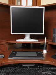 Home office computer desk with a monitor