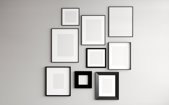 Empty white painted frames mockup close up on grey wall. Decorative black frames.White wall background. Template for artwork, painting, photo or poster. 3d rendering