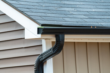 rain gutter of roof with downpipe