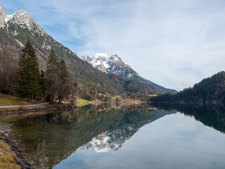 Fototapeta na wymiar Reflection in lake, nobody. Nice day at the Hintersteiner See, Austria.