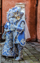 Fototapeta na wymiar Portrait of a disguised Couple - Venice Carnival 2012