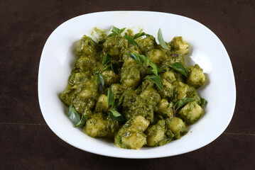 tasty italian pasta basil pesto gnocchi with herbs