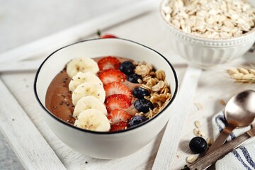 Chocolate oatmeal smoothie bowl | Healthy breakfast concept