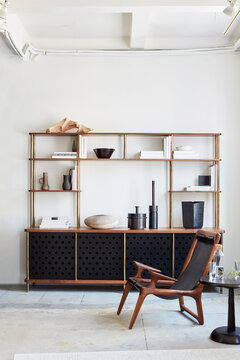 Modern, wood and metal Livingroom console with chair and table