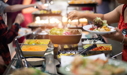 scooping the food, catering, dinner time