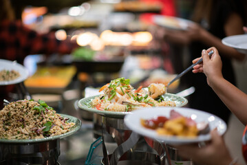 scooping the food, catering, dinner time