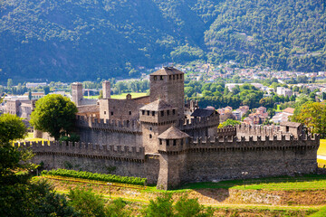 Scenic view of ancient stone Montebello Castle on hilltop in Swiss town of Bellinzona on sunny summer day, canton of Ticino