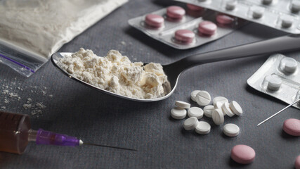 Different hard drugs on light grey table, closeup
