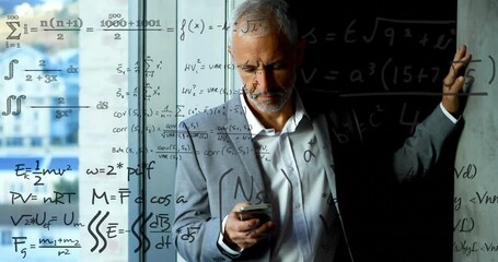 Animation of mathematical equations over caucasian businessman using smartphone - Powered by Adobe