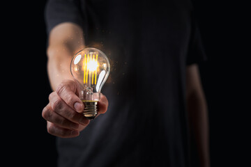 Hands holding light bulb for Concept new idea concept with innovation and inspiration, innovative technology in science and communication concept,