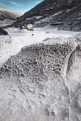 Tafoni Tafone Gestein Stein Lava Struktur Löcher porös Poren durchlöchert Struktur Waben...