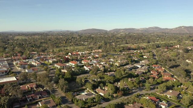 Aerial drone flight over upscale real estate properties in Rancho Santa Fe, California.