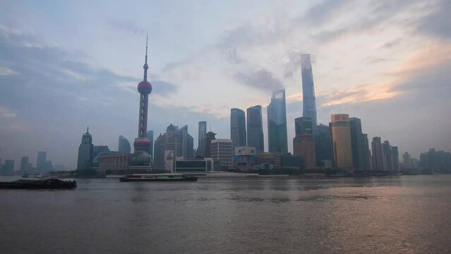 Time lapse of Shanghai skyline from The Bund during sunrise