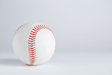 Baseball ball on white background, space for text. Sports game